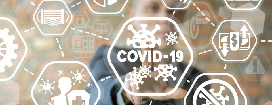 Person touching a screen that says COVID-19 surrounded by bacteria icons
